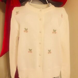 Just in NWOT Ivory Pearl Cherry Cardigan from MYHALF Clothing Designs